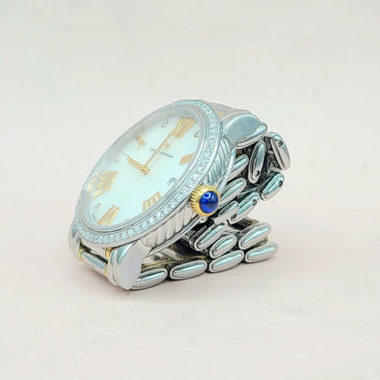 Silver watch with a light blue face on a white background